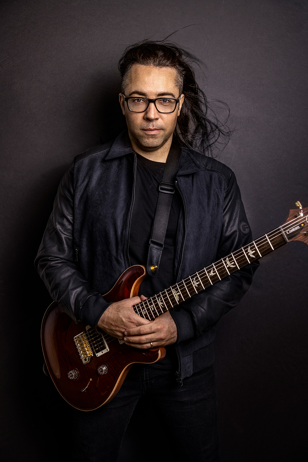 Gustavo Carmo with a guitar